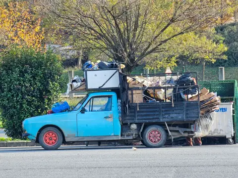 A truck loaded for junk removal