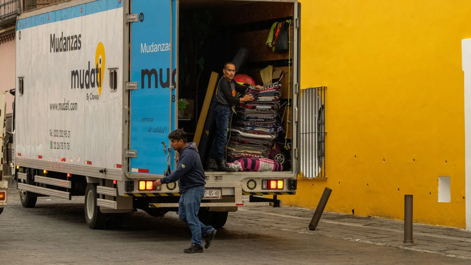 Movers loading a truck on moving day