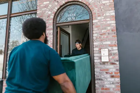 Furniture being delivered to a home
